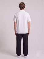 Casual White Knit Polo with Tagless Collar | Fabric Studio